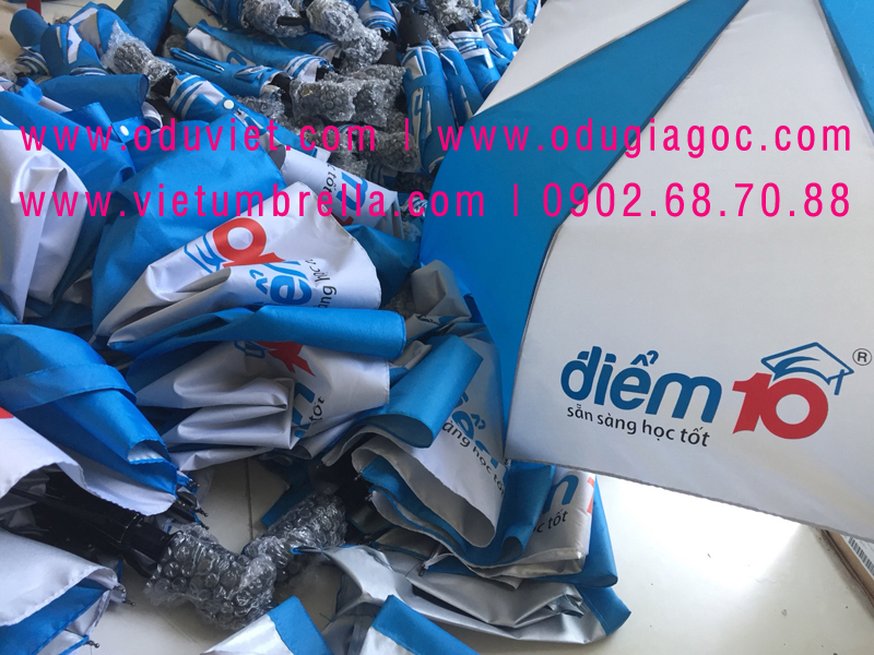 xưởng sản xuất ô dù cầm tay in logo quảng cáo